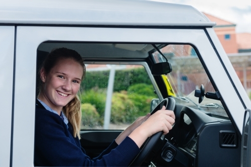 teen learner driver at the wheel of a car