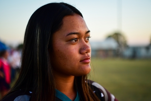 Teenage Maori girl at sporting contest