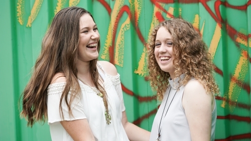 Teenager girls laughing - Australian Stock Image