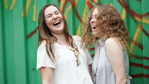 Teenager girls really laughing - Australian Stock Image