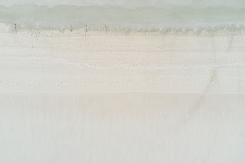 Texture of the dry surface on a salt lake in Western Australia. - Australian Stock Image