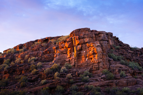 The Arid rocky cliff face in Outback Australia - Australian Stock Image