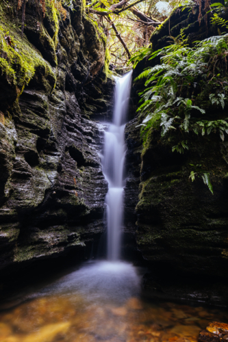 The beautiful Secret Falls situated on the slopes of Mt Wellington near Myrtle Gully Falls. - Australian Stock Image