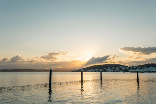 The Belmont Baths at Lake Macquarie at sunset - Australian Stock Image