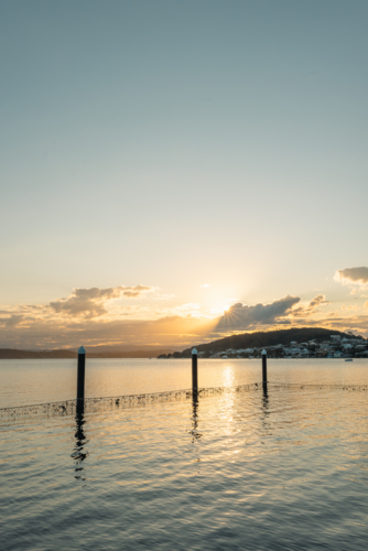 The Belmont Baths at Lake Macquarie at sunset - Australian Stock Image