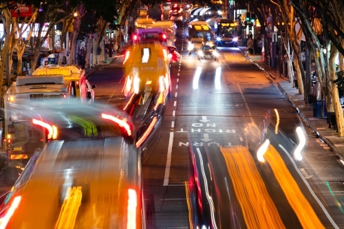 The busy movement of buses and traffic during peak hour along Adelaide Street at peak hour - Australian Stock Image