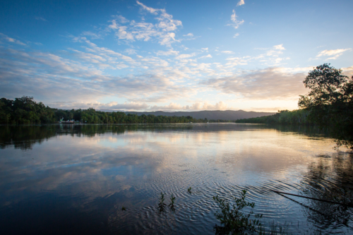 The Daintree River at sunset near the ferry crossing in far nth Queensland, Australia - Australian Stock Image