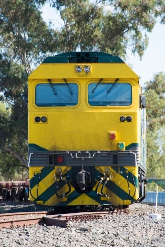 The face of a yellow train running on the railway - Australian Stock Image