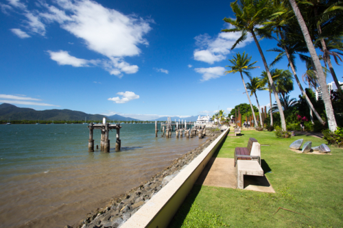 The famous Cairns waterfront and Chinaman Creek on a sunny winter's day in Queensland, Australia - Australian Stock Image