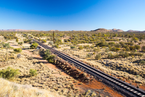 The famous Ghan railway near Alice Springs extends all the way to Darwin in Northern Territory - Australian Stock Image