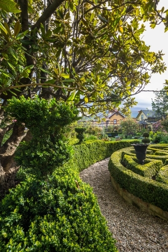 The gardens and hedges of the historic Corinda accommodation in Hobart - Australian Stock Image