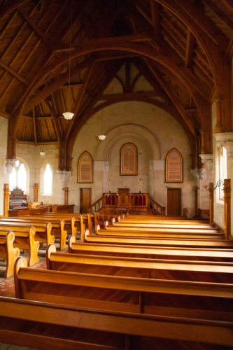 The historic interior on a sunny day in Ross Uniting Church - Australian Stock Image