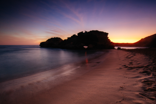 The London Bridge rock at sunset in Portsea, Victoria, Australia - Australian Stock Image