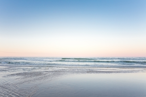 The ocean and waves at sunset - Australian Stock Image