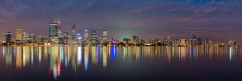 The Perth city skyline and reflection in the swan river at night - Australian Stock Image