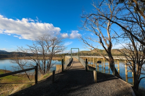 The Rail Trail bridge crossing over Lake Eildon from Bonnie Doon in Victoria - Australian Stock Image