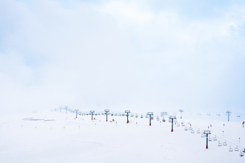 The Summit ski lift at Mt Hotham in foggy conditions - Australian Stock Image