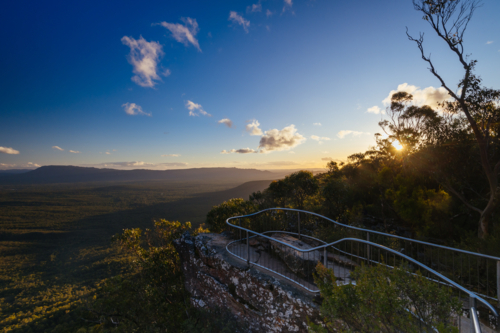The view from the Balconies near Reed Lookout and fire tower at sunset in the Grampians, Victoria - Australian Stock Image