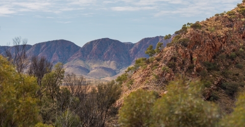 The West Macdonnell Ranges rising out of the earth