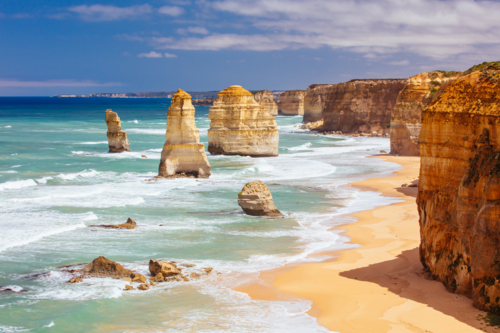 The world famous 12 Apostles on a bright sunny day along the Great Ocean Rd near Port Campbell - Australian Stock Image