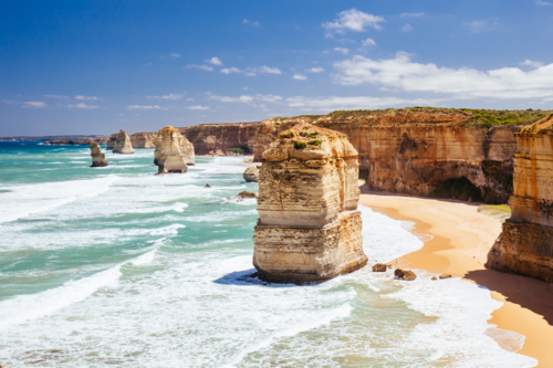The world famous 12 Apostles on a bright sunny day along the Great Ocean Rd near Port Campbell - Australian Stock Image