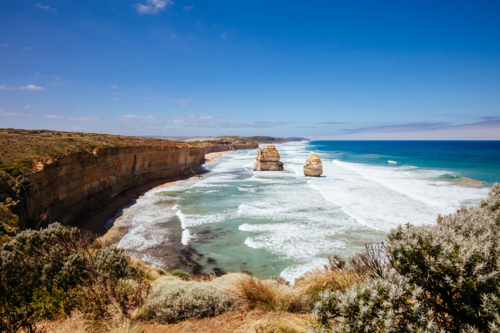 The world famous 12 Apostles on a bright sunny day along the Great Ocean Rd near Port Campbell - Australian Stock Image