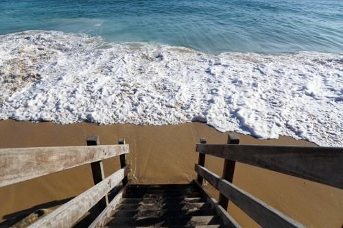 Timber steps down to the beach - Australian Stock Image