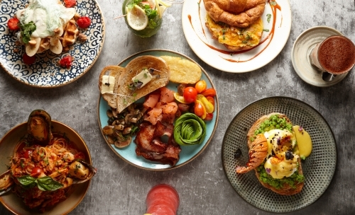 Top down of appetising dishes on table - Australian Stock Image