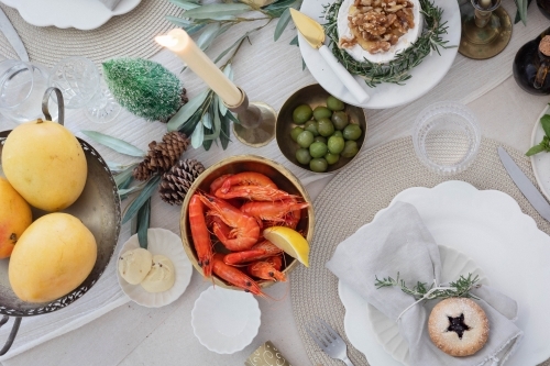 Top-down shot of table prepared for Christmas meal - Australian Stock Image
