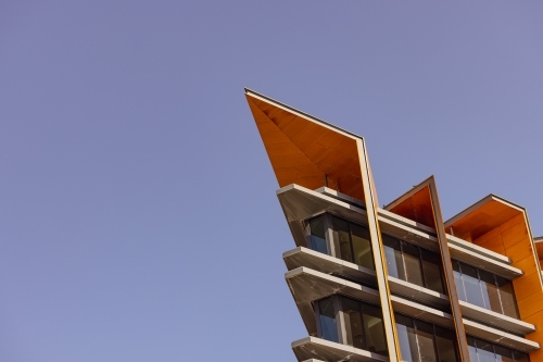 Top floors of high rise office building with pointed roof - Australian Stock Image