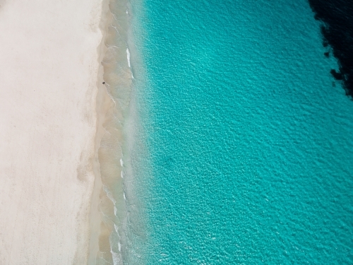 top shot of a white sand beach on a sunny day - Australian Stock Image