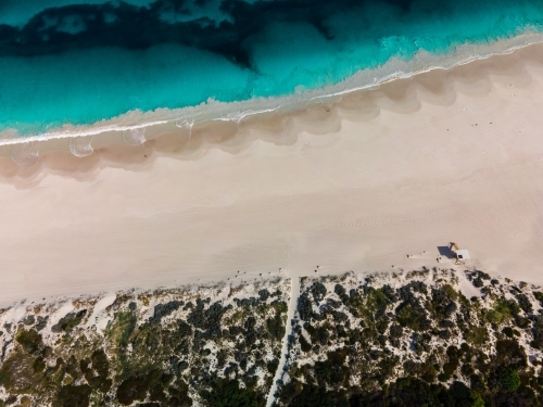 top shot of Summers in Perth with white sand, green grass and ocean water - Australian Stock Image
