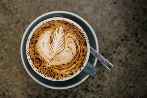 Top view of a coffee served in a cup - Australian Stock Image