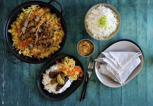 Top view of beef skewers and rice dish meal - Australian Stock Image