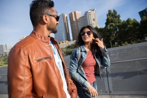 Tourist Couple Walking to Melbourne Park - Australian Stock Image