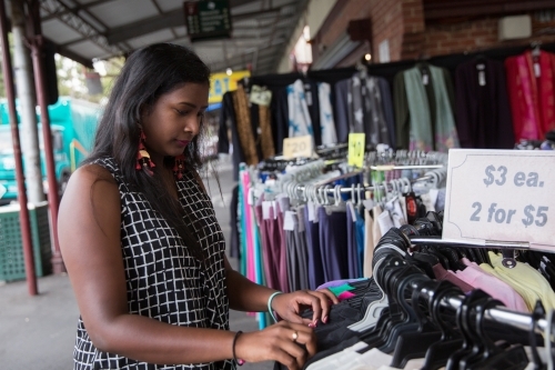 Tourist Shopping at the Market - Australian Stock Image