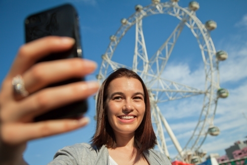Tourist Taking a Selfie in Docklands - Australian Stock Image