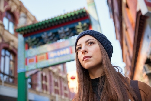 Tourist Waiting at Chinatown Entrance - Australian Stock Image