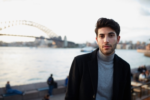 Tourist with Sydney Harbour Bridge in background - Australian Stock Image