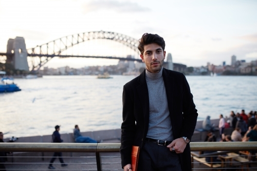 Tourist with Sydney Harbour Bridge in background - Australian Stock Image