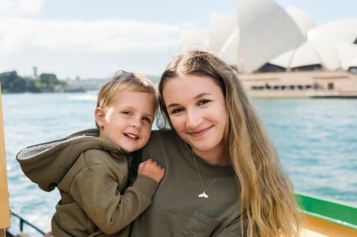 tourists on ferry in front of sydney opera house - Australian Stock Image