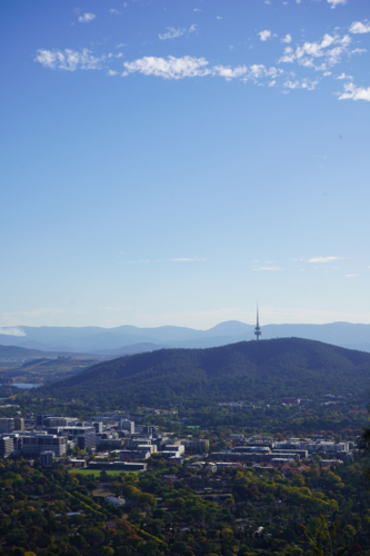 Tower in Canberra surrounded by mountains - Australian Stock Image