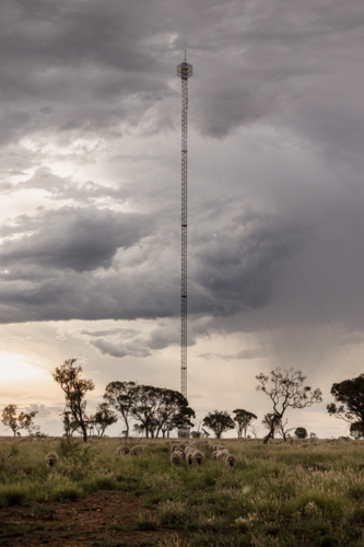 Tower with storm in background - Australian Stock Image
