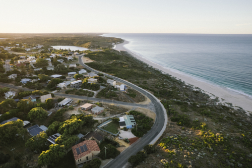 Town of Guilderton, Moore River and the Indian Ocean at sunrise in Western Australia - Australian Stock Image