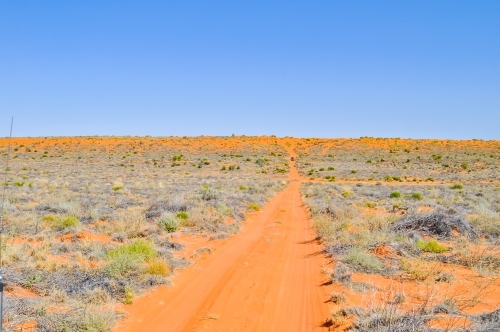 track leading to a sand dune - Australian Stock Image