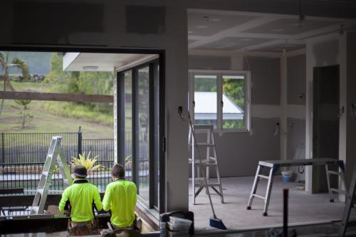 Tradesmen working on a home renovation. - Australian Stock Image