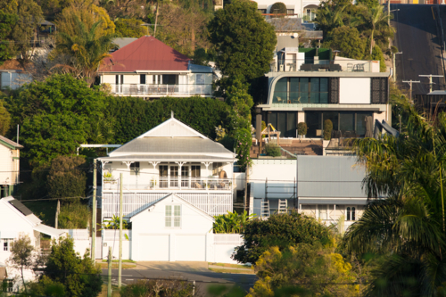 Traditional, old and modern houses on a steep sided slope in Red Hill, Brisbane - Australian Stock Image