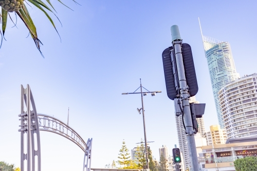 traffic light and Surfers Paradise sign at the beach access from Cavill Avenue on the Gold Coast - Australian Stock Image