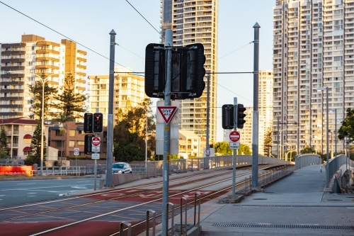 Traffic lights at G:Link light rail tram crossing on the Gold Coast - Australian Stock Image