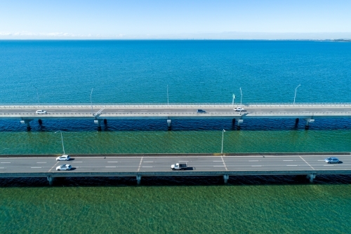 Traffic on two bridges over water. - Australian Stock Image